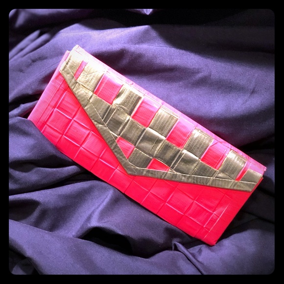 hand made duct tape wallet with colored lace deisgn on it